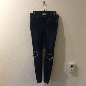 Free people busted knee skinny jeans